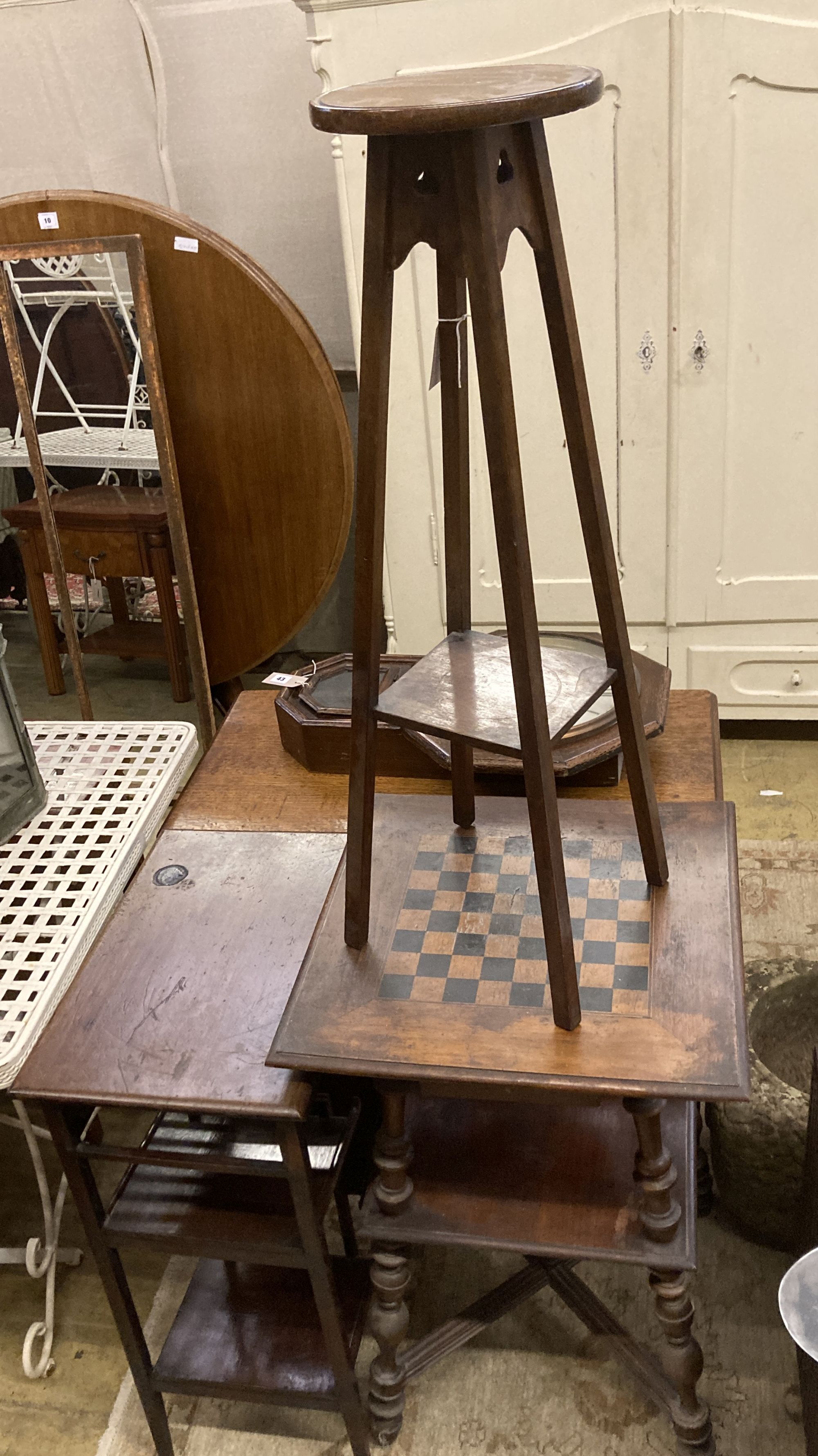 A Victorian two tier games table, width 50cm, depth 50cm, height 79cm together with an aesthetic movement side table and a plant stand